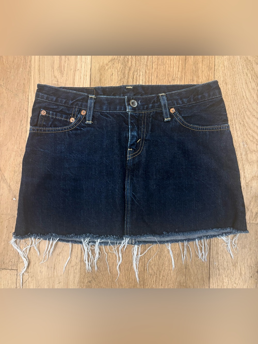 Levi’s Vintage Dark Wash Denim Mini Skirt with Frayed Hem